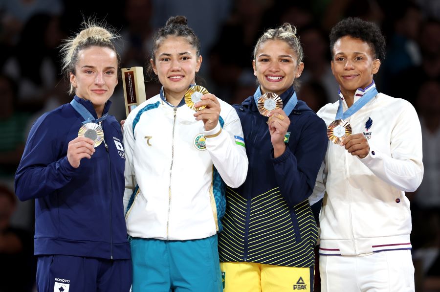 Silver medalist Distria Krasniqi of Kosovo, gold medalist Diyora Keldiyorova of Uzbekistan, bronze medalist Larissa Pimenta of Brazil and bronze medalist Amandine Buchard of France pose with their medal after the Women -52kg category of the Judo competitions in the Paris 2024 Olympic Games, at the Champs-de-Mars Arena in Paris, France, 28 July 2024. EPA-EFE/DANIEL IRUNGU