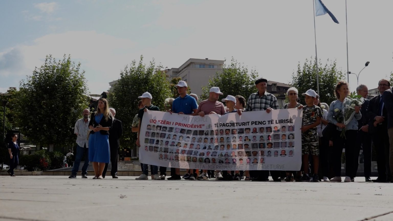 A banner with photos of missing persons from Kosovo. Photo: BIRN. 