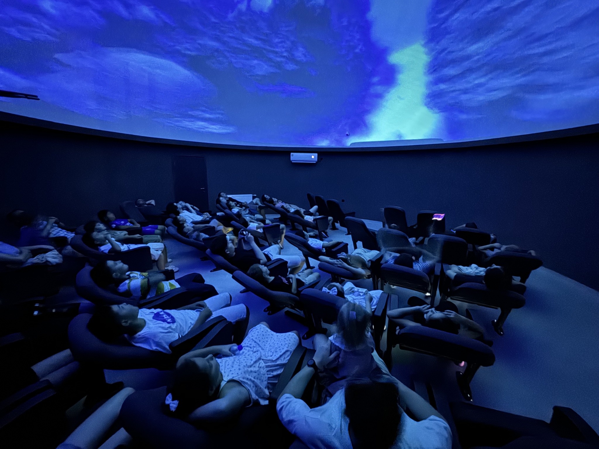 Pupils watching a documentary inside the planetarium. Photo: Astronomy Outreach of Kosovo.