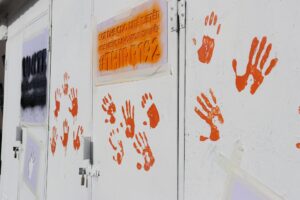 Painting featuring the message "Today and every other day. Don’t stay silent, report violence" displayed on electricity transformers across Kosovo, aiming to raise awareness and inspire action against gender-based violence. Photo: UN Women Kosovo.