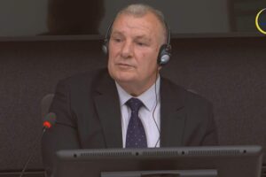 Shukri Buja testifying in court on Wednesday, November 6, 2024. Photo: Livestream/Kosovo Specialist Chambers