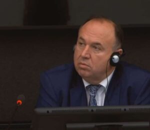 Sokol Bashota testifying in court on December 4, 2024. Photo: Kosovo Specialist Chambers/Livestream.