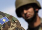 The Kosovo flag is seen in the uniform of a member of the Kosovo Security Force (KSF) during a ceremony in Pristina, Kosovo, August 18, 2009. Photo: EPA/VALDRIN XHEMAJ