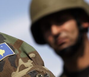 The Kosovo flag is seen in the uniform of a member of the Kosovo Security Force (KSF) during a ceremony in Pristina, Kosovo, August 18, 2009. Photo: EPA/VALDRIN XHEMAJ