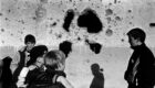 Young boys stand in front of the ruins of Adem Jashari's house, destroyed by Serbian forces in Prekaz. Photo: Joakim Roos