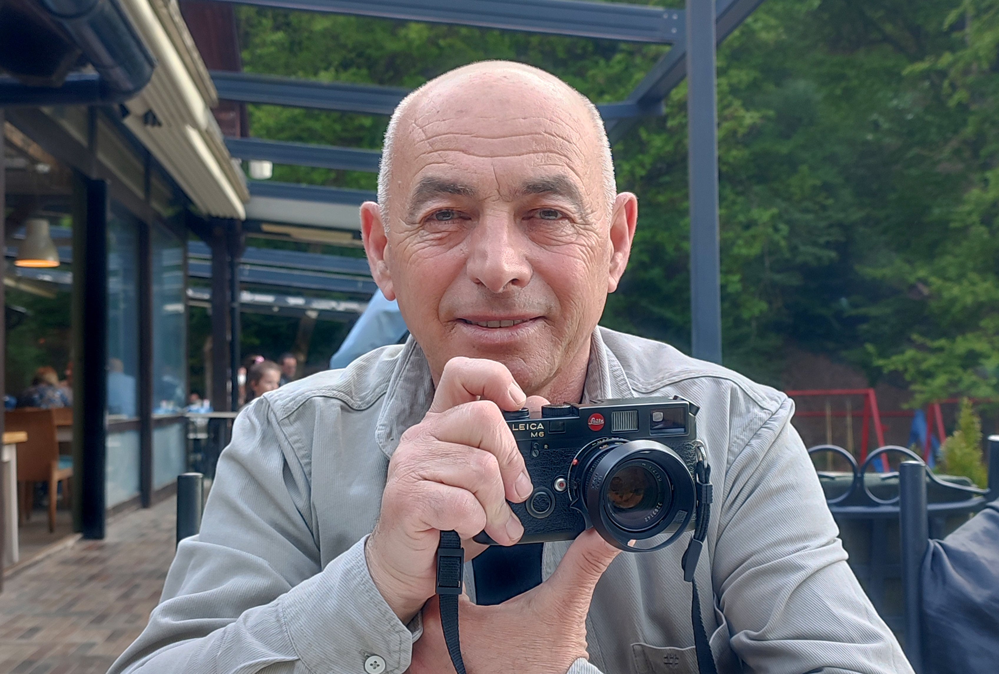 Ridvan Slivova holding his camera. Photo: Courtesy of Ridvan Slivova