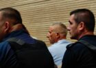 Caslav Jolic (middle) at Prishtina Basic Court. Photo: BIRN.