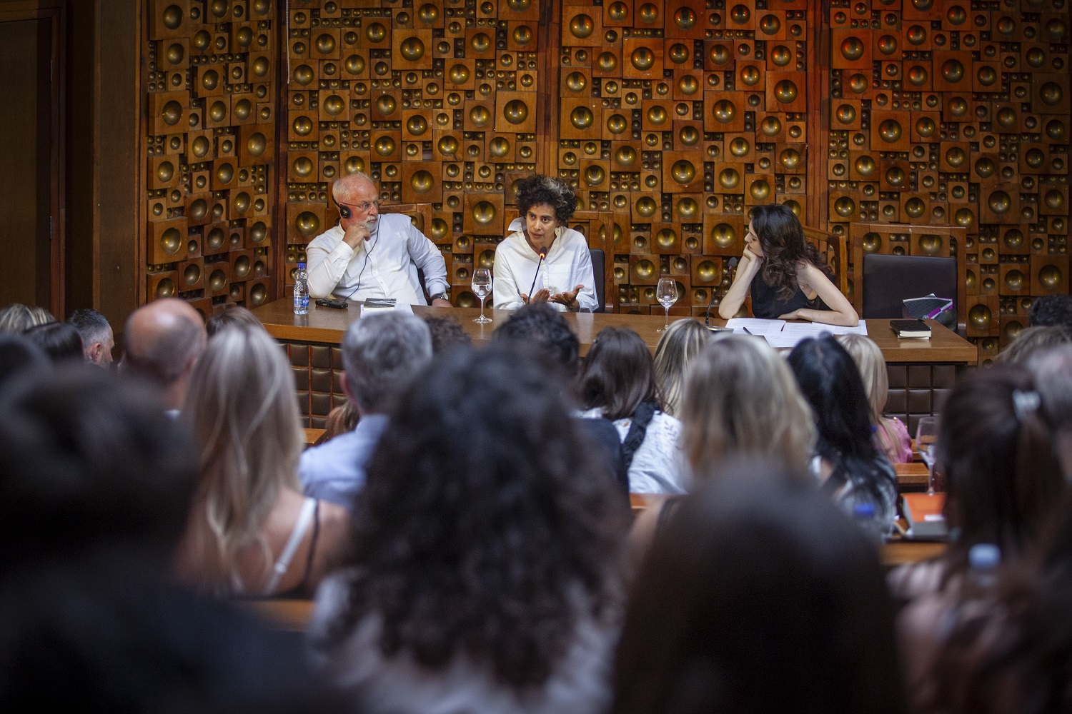 Adania Shibli (C) during a public discussion in Prishtina, Kosovo, June 19, 2025. Photo: CHwB Kosova/Majlinda Hoxha