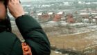 An OSCE officer checks the Studencane and Suva Reka area in Kosovo, February 1999. Photo: EPA/ATTILA KISBENEDEK/STF/AK/CL/OW.