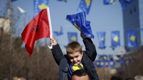 A Kosovo Albanian waves Albanian and Kosovo national flags during a ceremony to mark the 12th anniversary of Kosovo's independence in Pristina, Kosovo, February 17, 2020. Photo: EPA/VALDRIN XHEMAJ