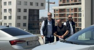 Bojan Jevtic, a Kosovo Police officer suspcted of espionage, is taken to Pristina Basic Court on July 18, 2025. Photo: BIRN
