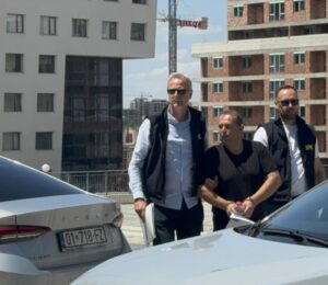 Bojan Jevtic, a Kosovo Police officer suspcted of espionage, is taken to Pristina Basic Court on July 18, 2025. Photo: BIRN