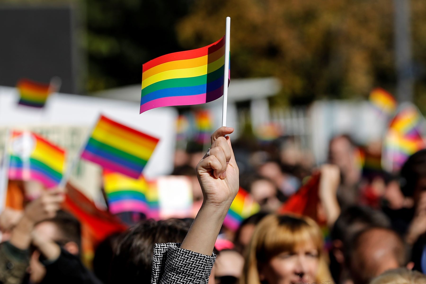 Participants wave rainbow flags as they join (LGBTIQ+) rights groups during Kosovo's first pride parade in October 2017. Photo: EPA/VALDRIN XHEMAJ