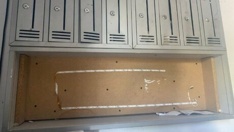 Electricity bills at the entrance of an apartment in Prishtina. Photo: Erlida Mulaku