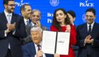 US President Donald Trump (C) holds a signed founding charter at the 'Board of Peace' meeting during the 56th annual meeting of the World Economic Forum (WEF), in Davos, Switzerland, 22 January 2026. Photo: EPA/Gian Ehrenzeller