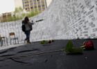 Kosovo Albanian women look at the names of missing people, written on a wall in Prishtina, Kosovo, on the day of missing persons from Kosovo 1998-99 war, on April 27, 2011. Photo from the archives: EPA/Valdrin Xhemaj