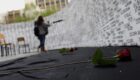 Kosovo Albanian women look at the names of missing people, written on a wall in Prishtina, Kosovo, on the day of missing persons from Kosovo 1998-99 war, on April 27, 2011. Photo from the archives: EPA/Valdrin Xhemaj