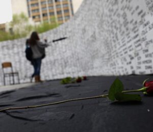 Kosovo Albanian women look at the names of missing people, written on a wall in Prishtina, Kosovo, on the day of missing persons from Kosovo 1998-99 war, on April 27, 2011. Photo from the archives: EPA/Valdrin Xhemaj