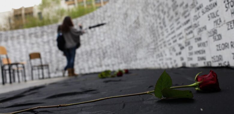 Kosovo Albanian women look at the names of missing people, written on a wall in Prishtina, Kosovo, on the day of missing persons from Kosovo 1998-99 war, on April 27, 2011. Photo from the archives: EPA/Valdrin Xhemaj
