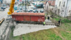 The process of transporting the wagon that carried refugees from Prishtina in 1999. This wagon is being transformed into the ‘Reporting House 2’ museum. Photo: BIRN