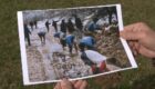 Gani Kosumi holds his photograph showing footballers having a wash in a stream after a match in March 1997. Photo: BIRN.