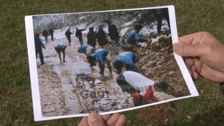 Gani Kosumi holds his photograph showing footballers having a wash in a stream after a match in March 1997. Photo: BIRN.