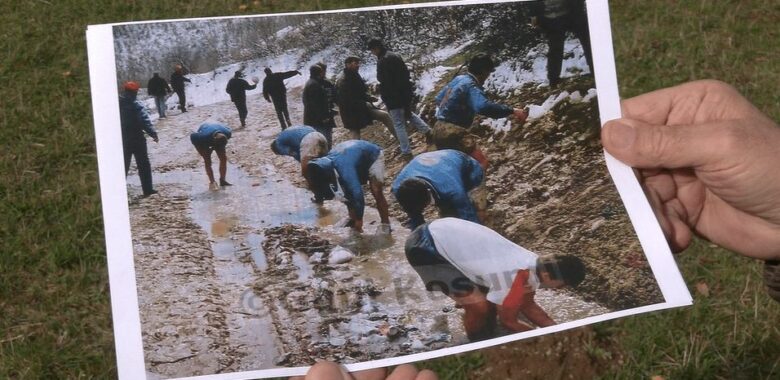 Gani Kosumi holds his photograph showing footballers having a wash in a stream after a match in March 1997. Photo: BIRN.