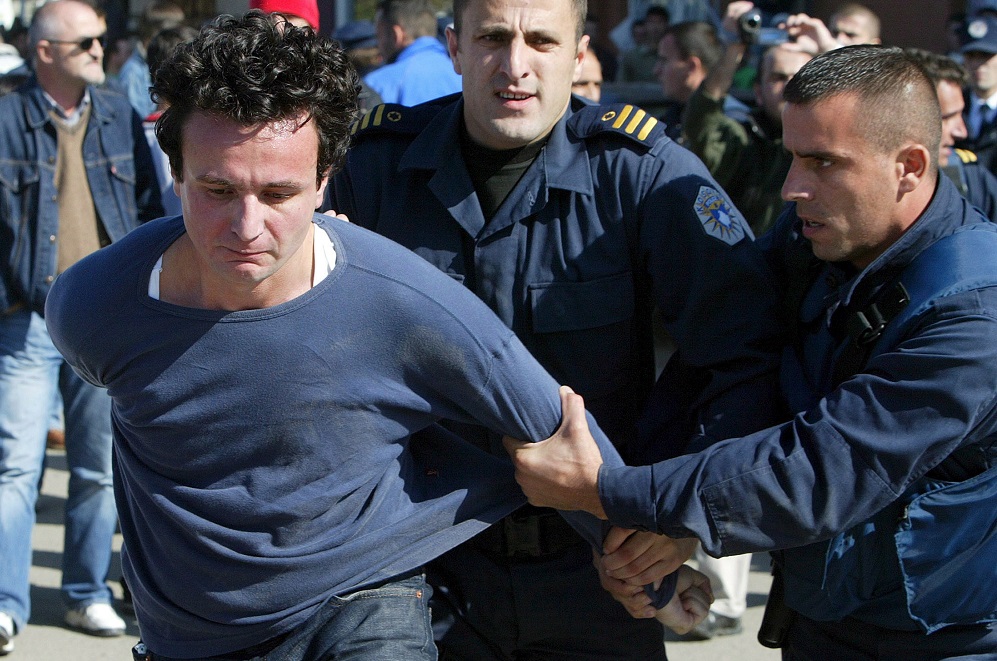 Kosovo police officers arrested Albin Kurti, leader of Vetëvendosje movement, at the time not a political party, in Prishtina, Kosovo, October 19, 2005. Photo: EPA/Valdrin Xhemaj